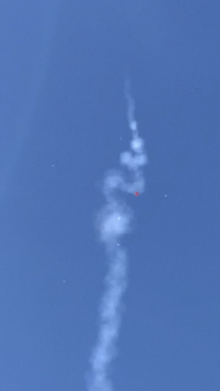 Muon breaking apart in flight, scattering airframe fragments across the sky